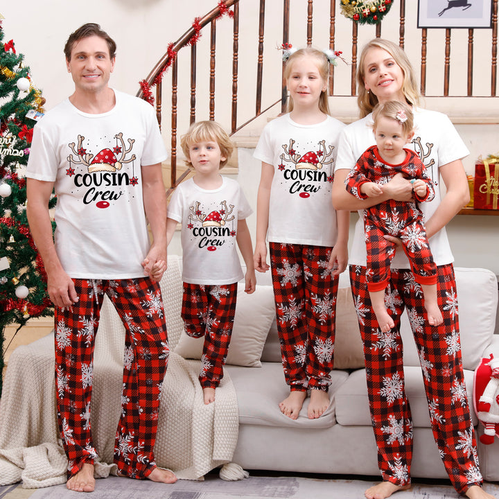 Family Matching Christmas PJs in white antler slogan