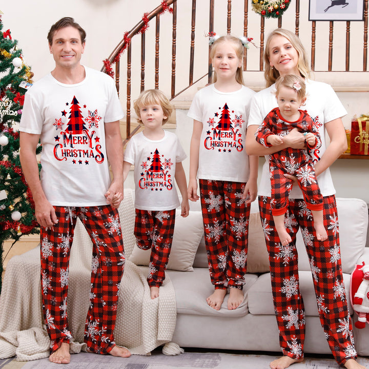 Family Matching Christmas PJs in white check tree
